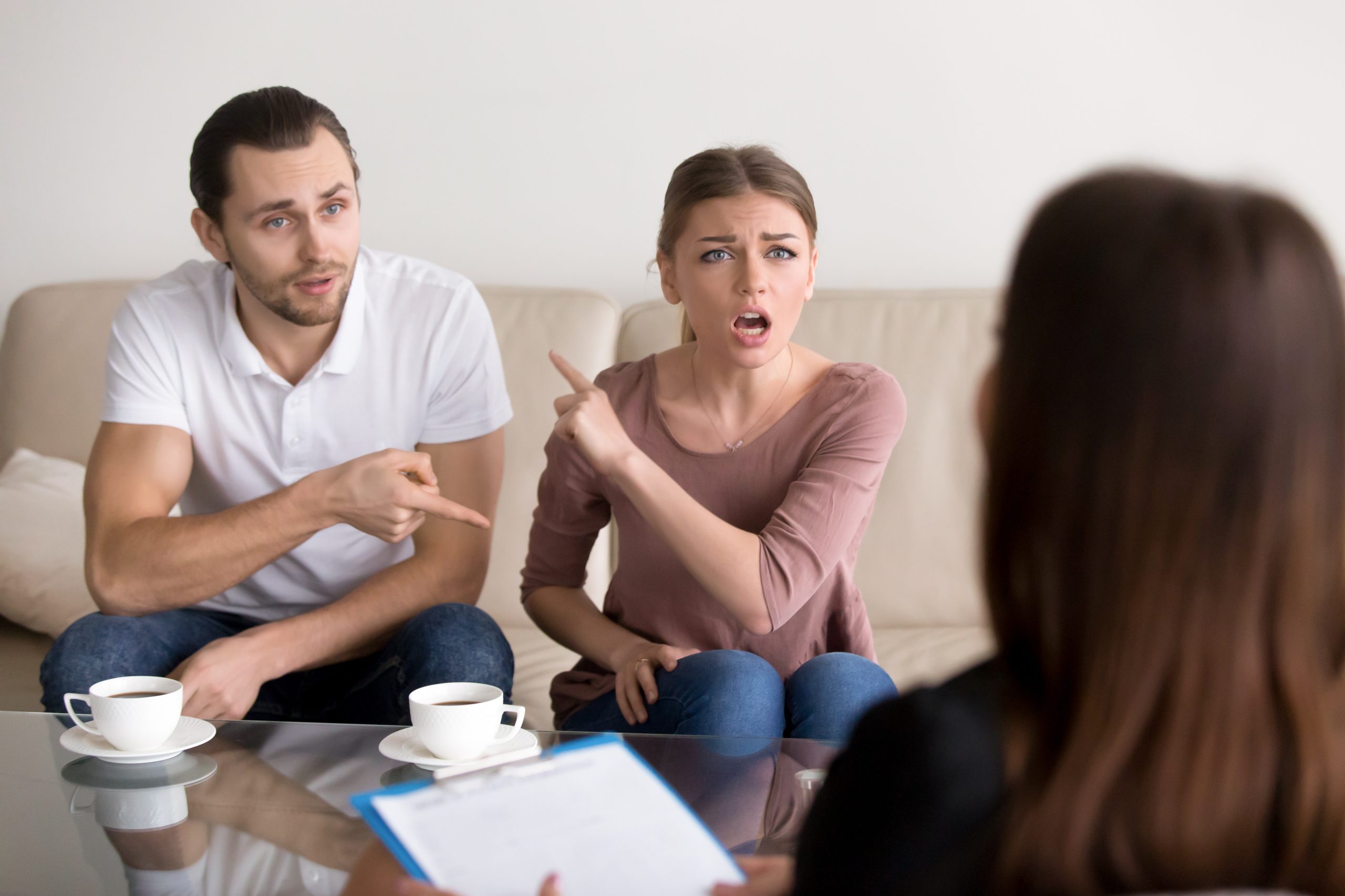 Couple in conversation in a warm, calm setting